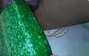 Jamaican Teen Plays Anent A Cucumber Amateur Homemade