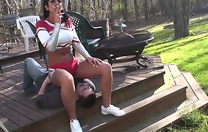 Cheerleader Christina uses a human ashtray