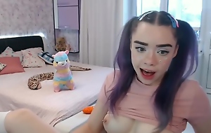 Cute girl sucking dildo and masturbating