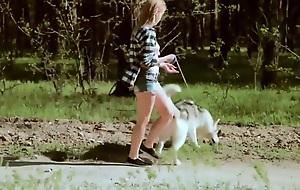 Beautiful code of practice girl takes a trek with the dog