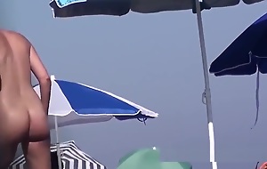 Curvy unconcealed Nudist Teen Bending Over Coast Voyeur Spycam Vid