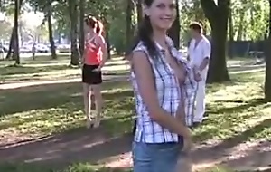 Public fluorescent be useful to a Russian hottie in the park