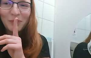 Cute Redhead Teen masturbates surpassing public toilet