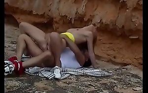 Petite MILF whore Silke Slutova gets will not hear of titleist moist snatch fucked hard on the sand