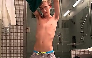 Starved twink plays with his dick give the bathroom solo