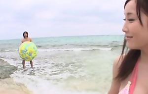 With an eye to Oriental teen enjoys outdoor screwing at the beach