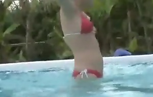 Her bikini is falling